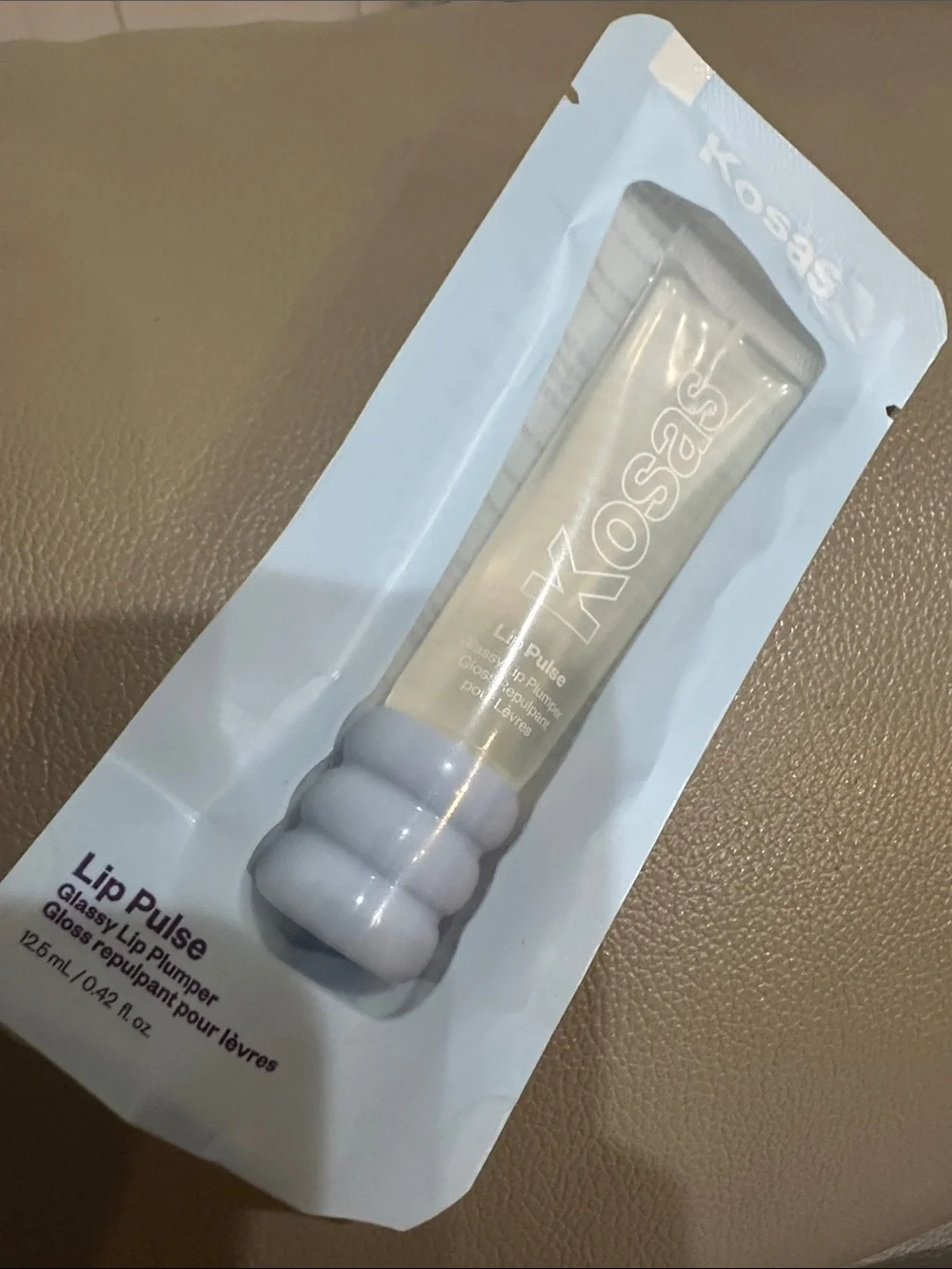 Kosas Lip Pulse Plumping Gloss — Unspoken (clear)